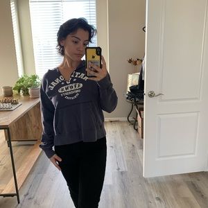 Cropped / distressed hoodie.